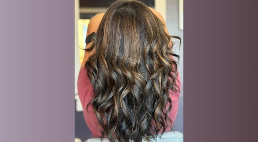 Elegant wavy hairstyle showcased at Five One Four, Littlehampton, England, GB.