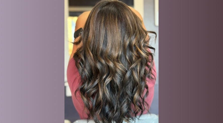 Elegant wavy hairstyle showcased at Five One Four, Littlehampton, England, GB.