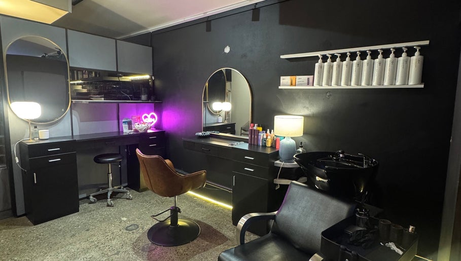 Stylish hair salon setup at Tanya J Hairstylist, Fortitude Valley, Queensland, AU with modern decor.