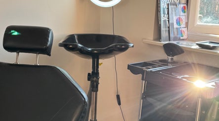 Sleek salon setup at Leah Marie Hairstylist, Bristol, England, GB, showcasing a modern shampoo station.