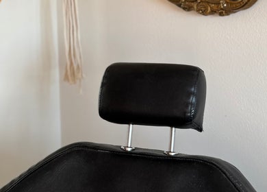 Comfortable styling chair at Leah Marie Hairstylist in Bristol, England, GB, highlighting luxury salon experience.