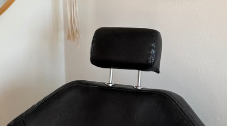Black salon chair at Leah Marie Hairstylist in Bristol, England, GB.