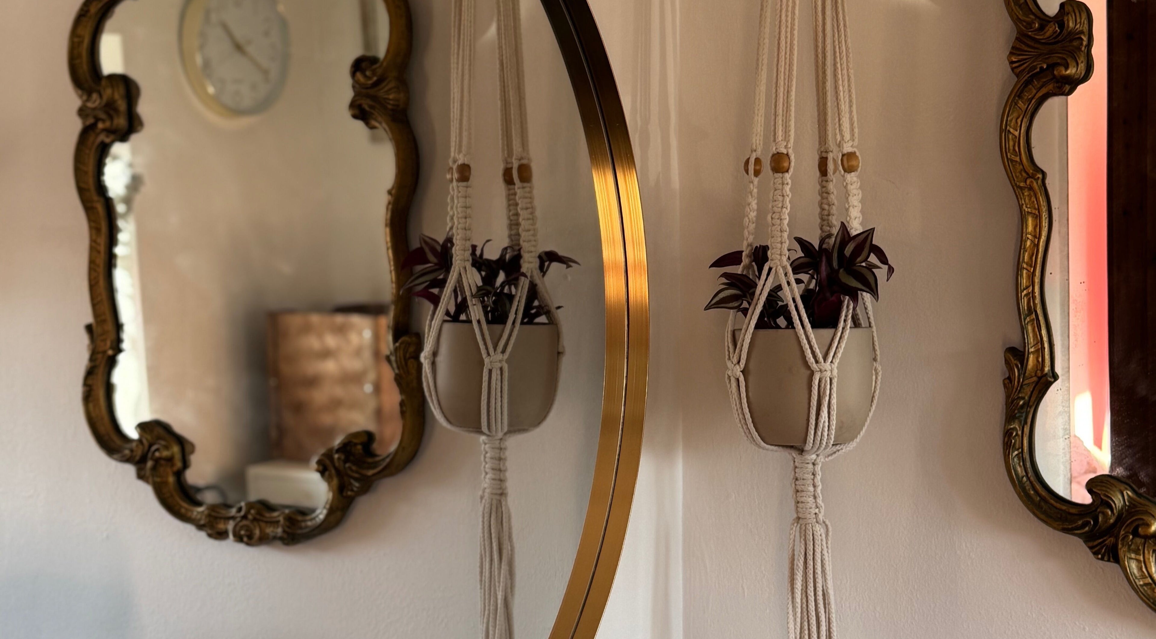 Elegant vintage mirrors and plant decor at Leah Marie Hairstylist, Bristol, England, GB.