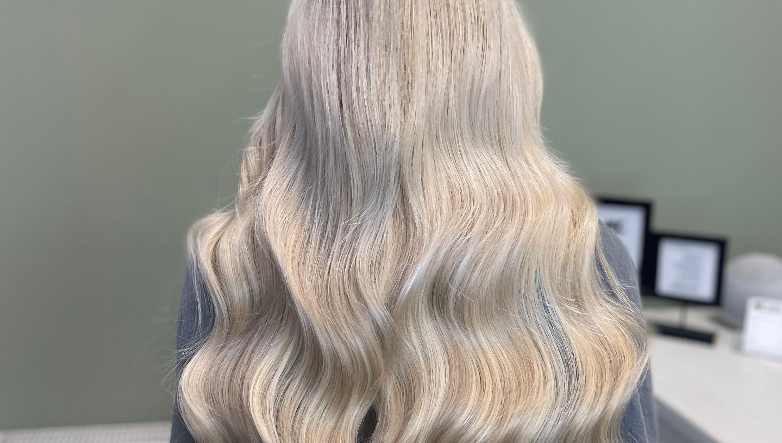 Blonde wavy hairstyle at Made.byellachambers in Kirkby In Ashfield, England, GB, showcasing salon's styling expertise.
