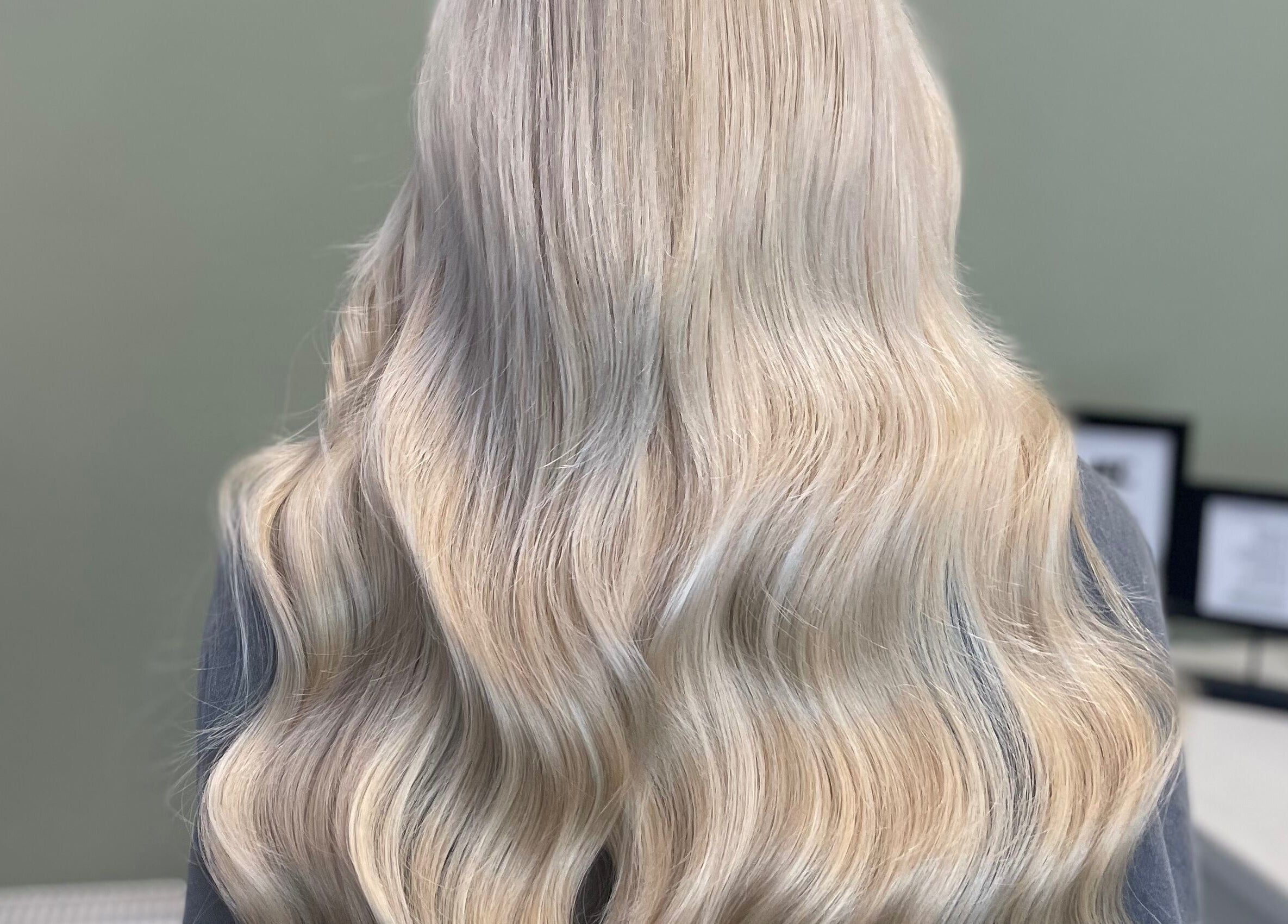 Blonde wavy hairstyle at Made.byellachambers in Kirkby In Ashfield, England, GB, showcasing salon's styling expertise.