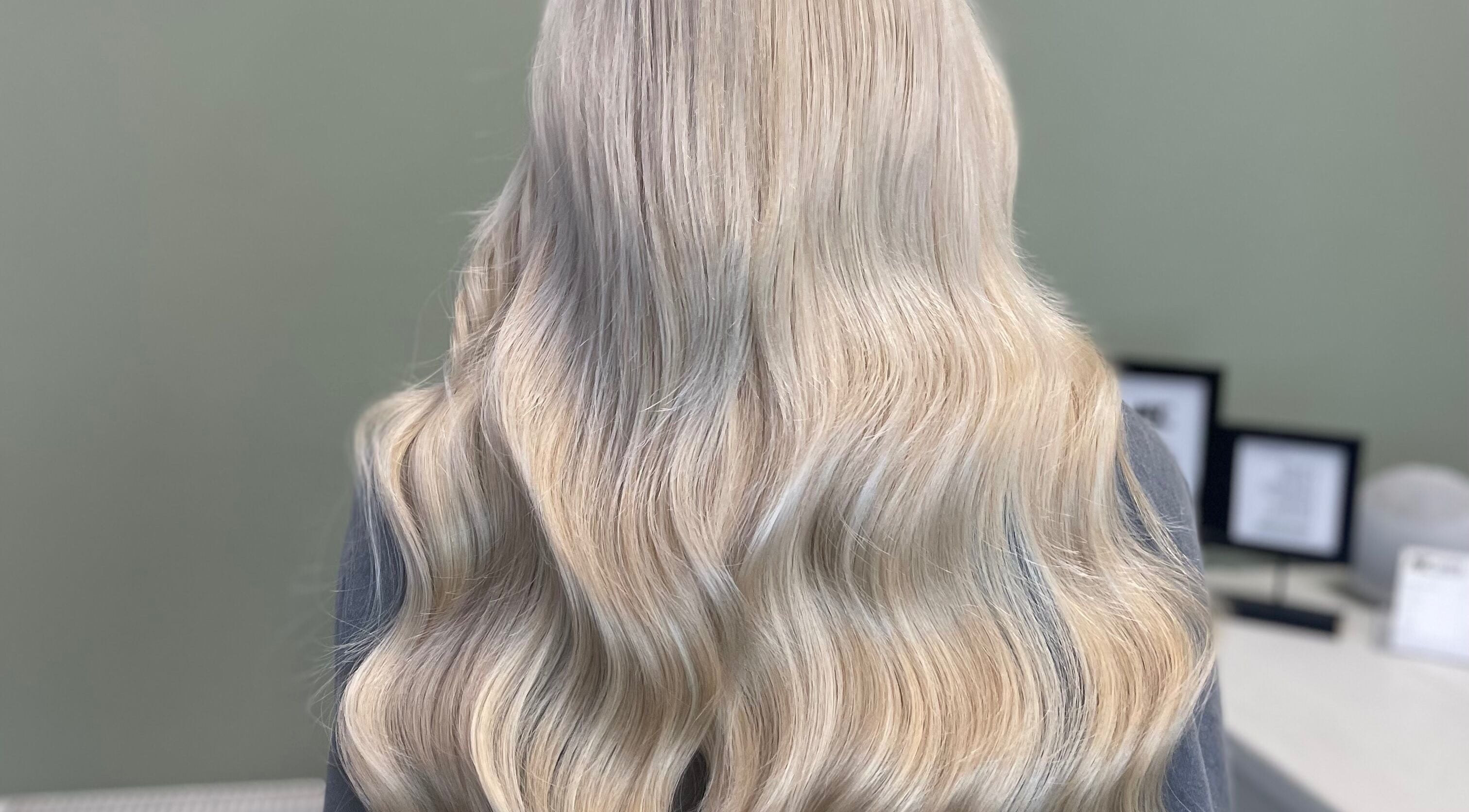 Blonde wavy hairstyle at Made.byellachambers in Kirkby In Ashfield, England, GB, showcasing salon's styling expertise.