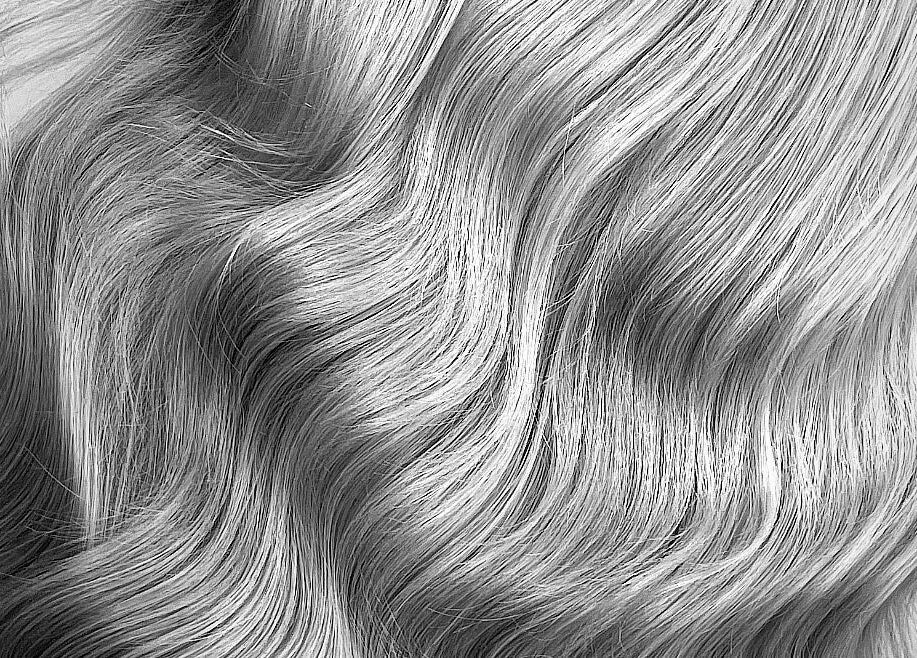 Elegant blonde hair waves styled at Made.byellachambers in Kirkby In Ashfield, England, GB.