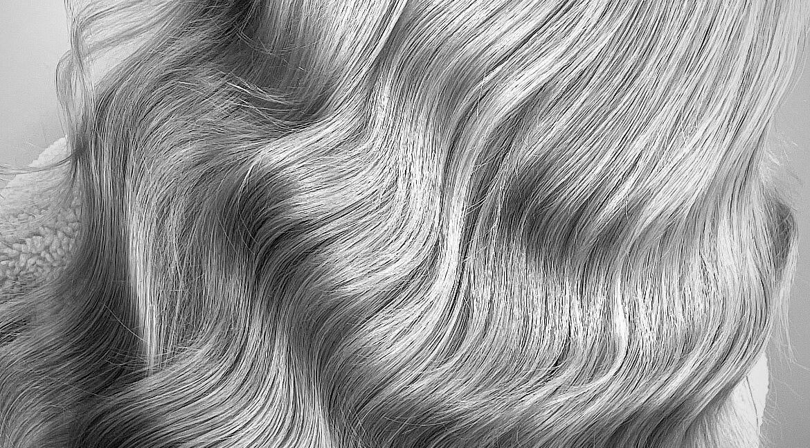 Elegant blonde hair waves styled at Made.byellachambers in Kirkby In Ashfield, England, GB.