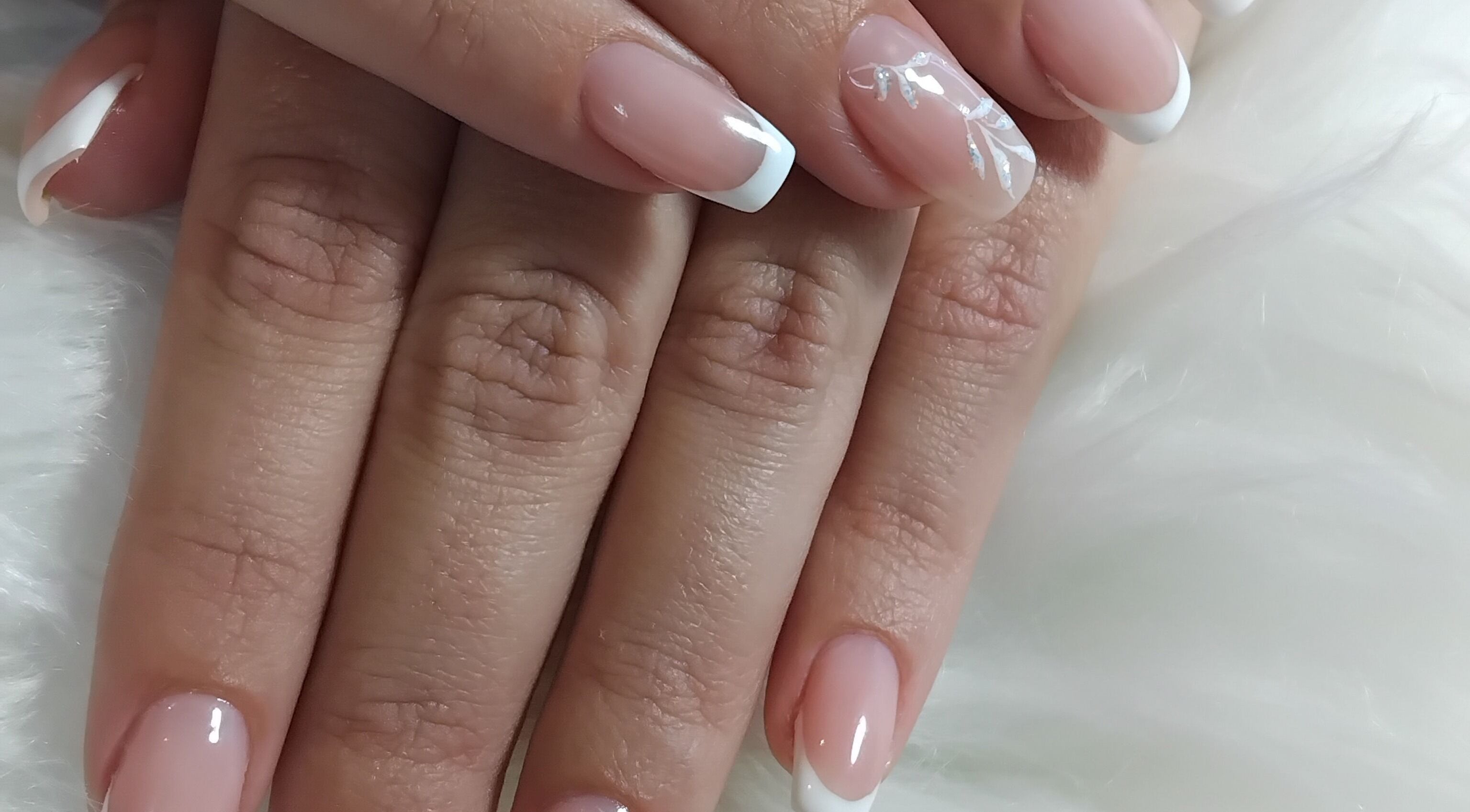 Elegant French manicure at Christy's Beauty Glamour, Edenvale, Gauteng, ZA, showcasing perfectly styled nails.