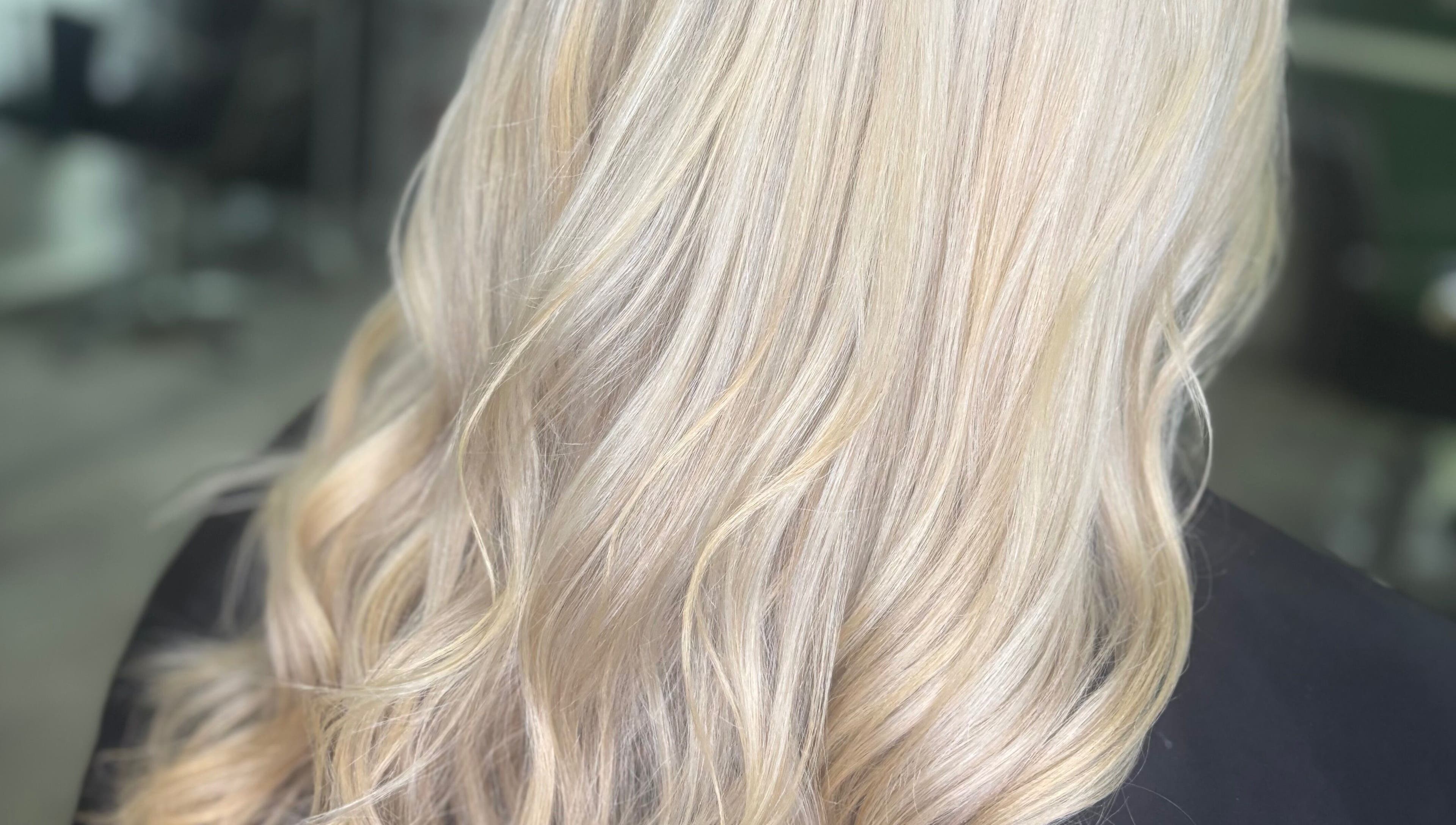 Elegant blonde waves styled at Cove Hair Beauty Wellness in Padstow, England, GB.
