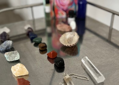Healing stones at Aura and Earth, Taunton, England, GB, on a silver tray enhancing relaxing ambiance.