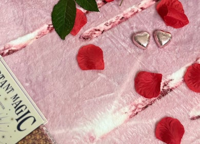 Romantic display with hearts and rose petals at Aura and Earth, Taunton, England, GB.
