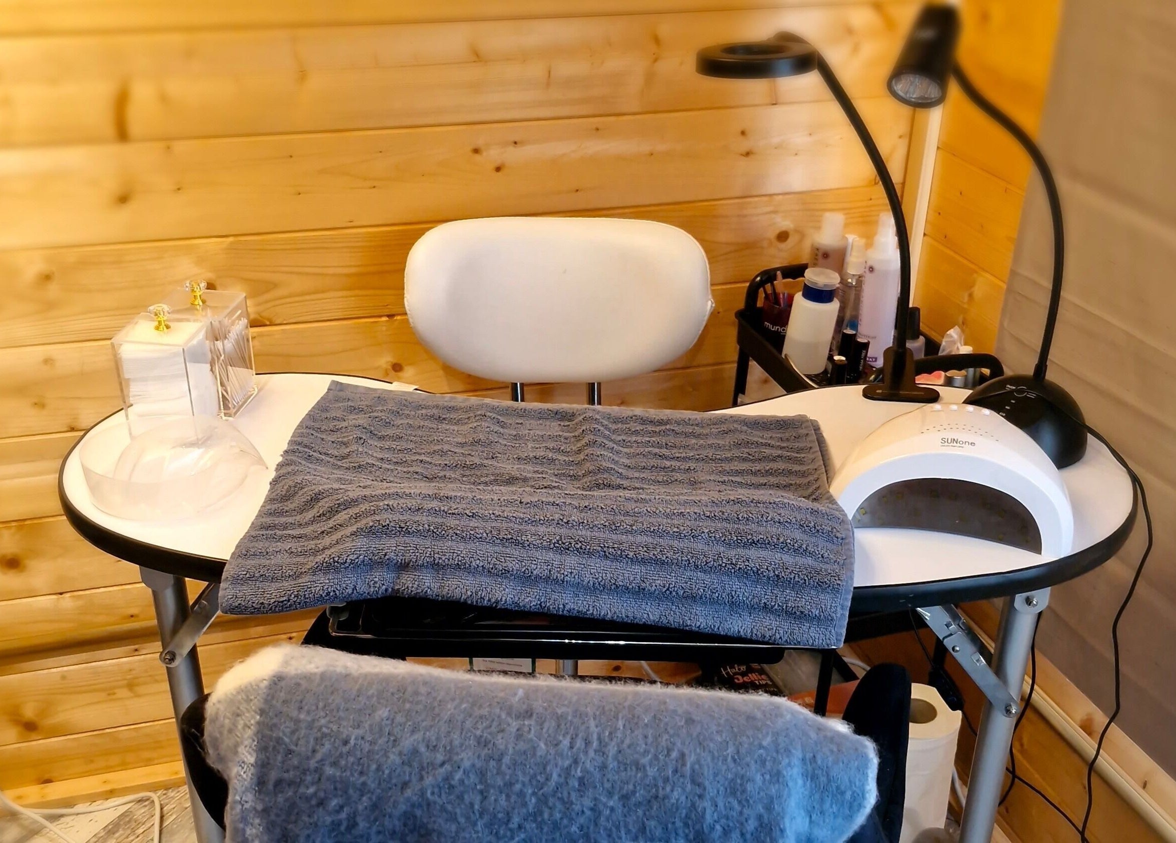 Manicure station at Bare Essential Beauty in Addington, England, GB, offering serene nail care services.