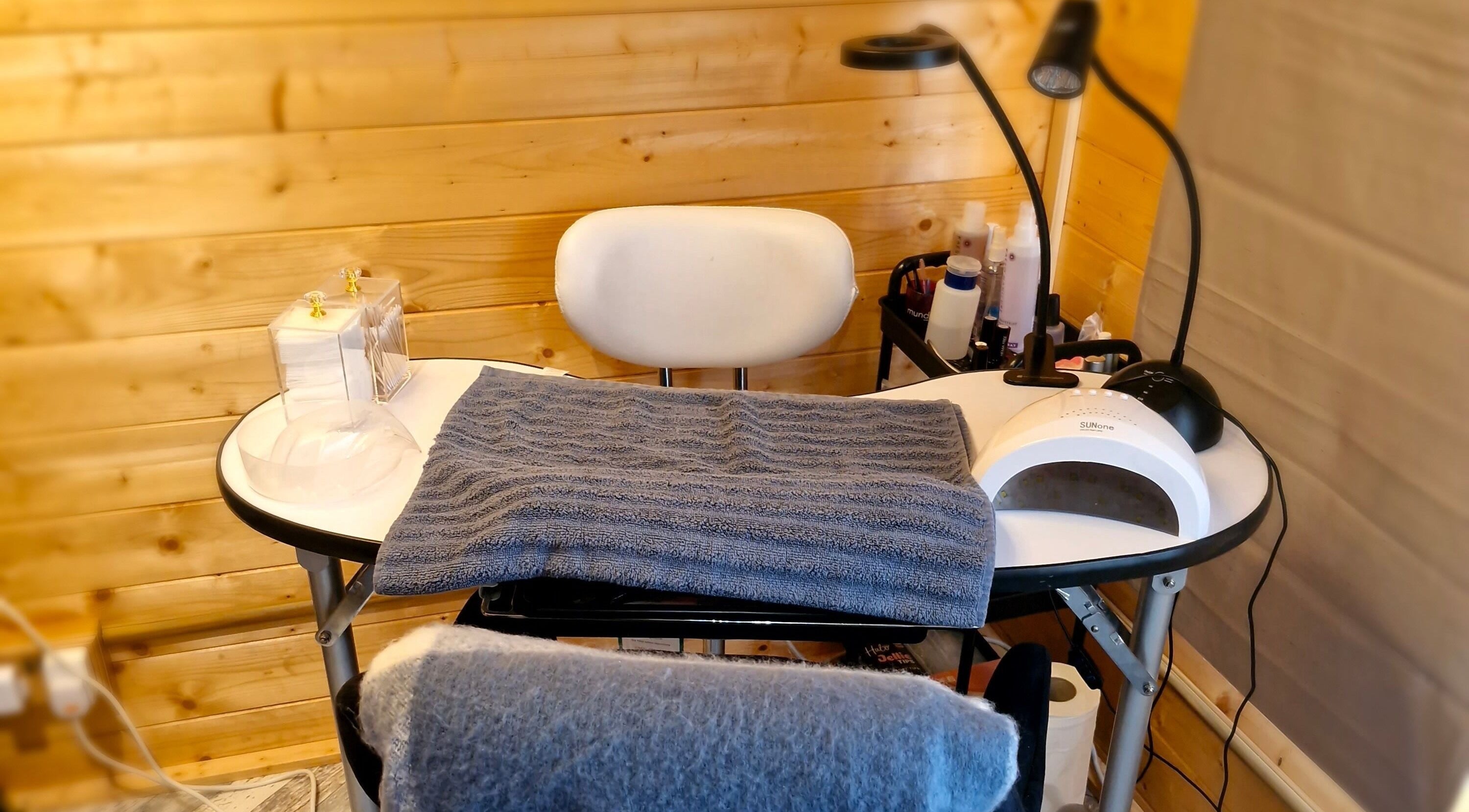 Manicure station at Bare Essential Beauty in Addington, England, GB, offering serene nail care services.