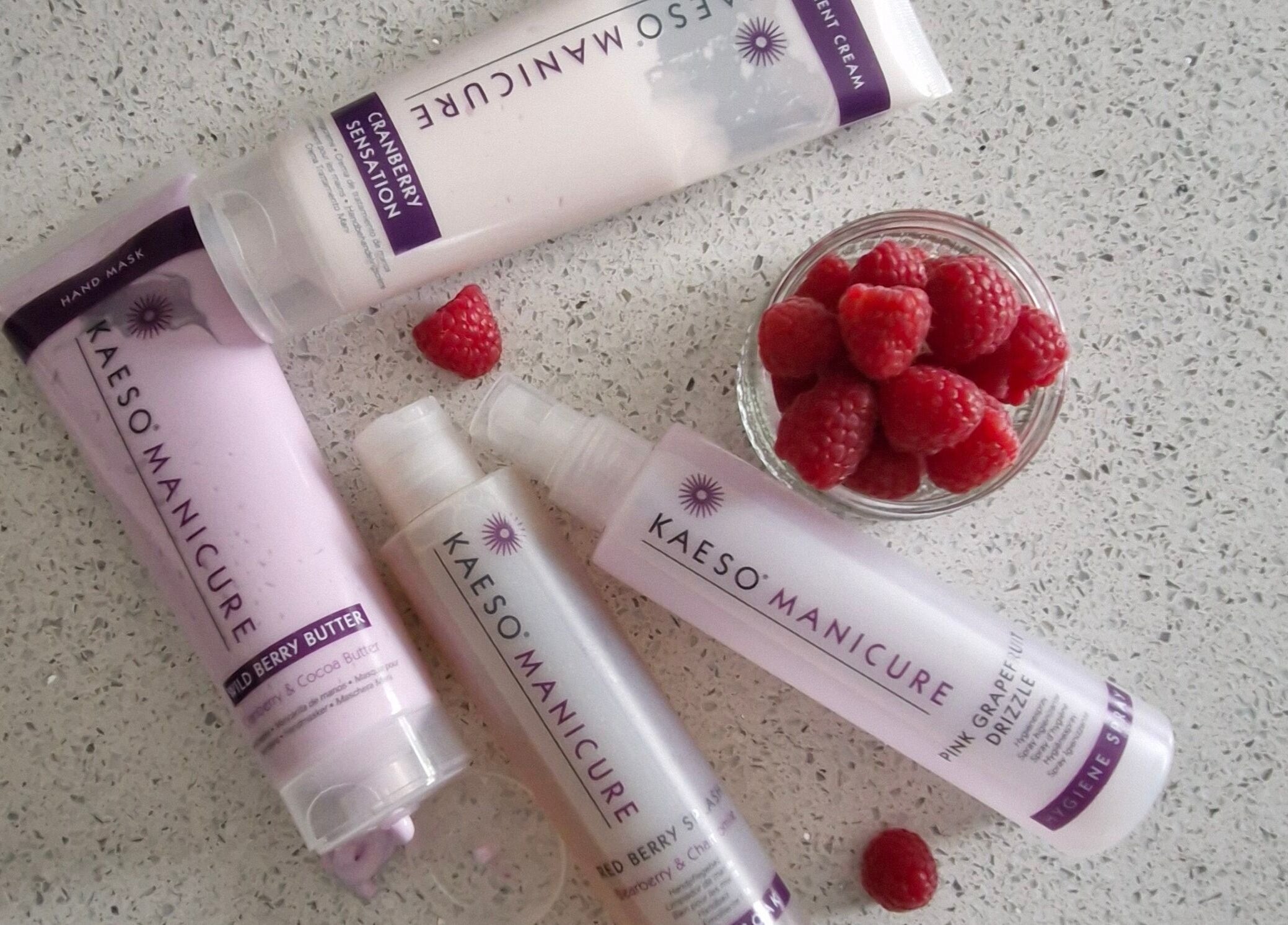 Kaeso manicure products with raspberries at Bare Essential Beauty, Addington, England, GB.