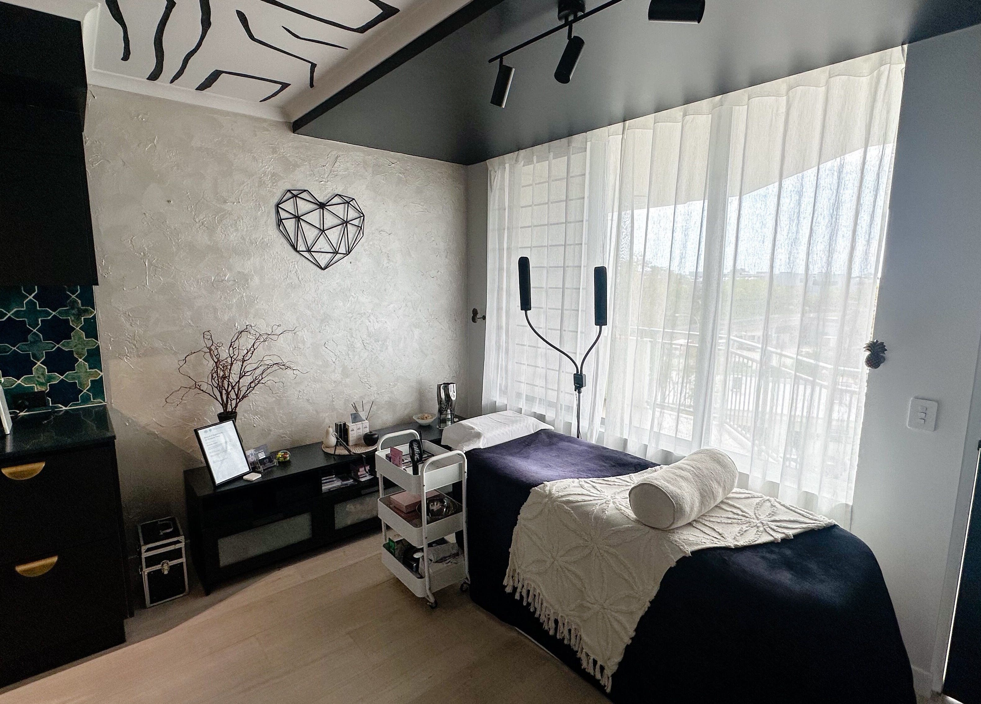 EYESMILE ARTISTRY's elegant beauty suite in Maroochydore, Queensland, AU with stylish decor and treatment bed.