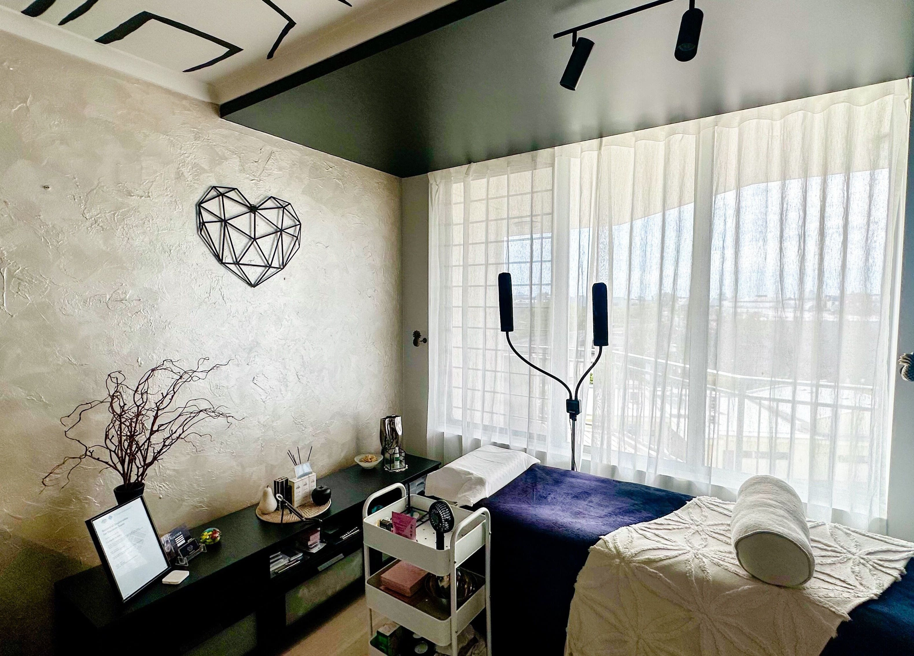 Relaxing treatment room at EYESMILE ARTISTRY, Maroochydore, Queensland, AU, with serene decor and natural light.