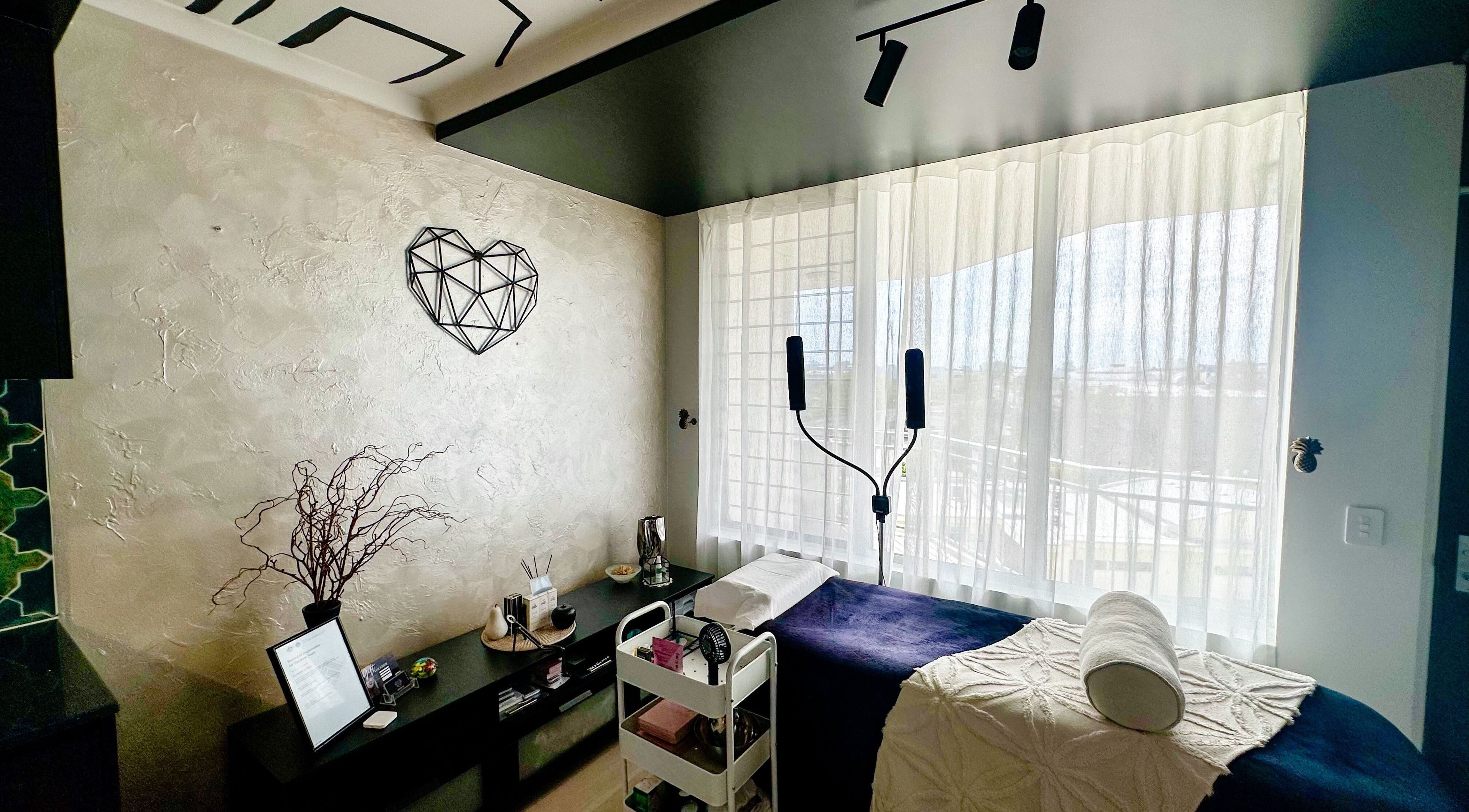 Relaxing treatment room at EYESMILE ARTISTRY, Maroochydore, Queensland, AU, with serene decor and natural light.