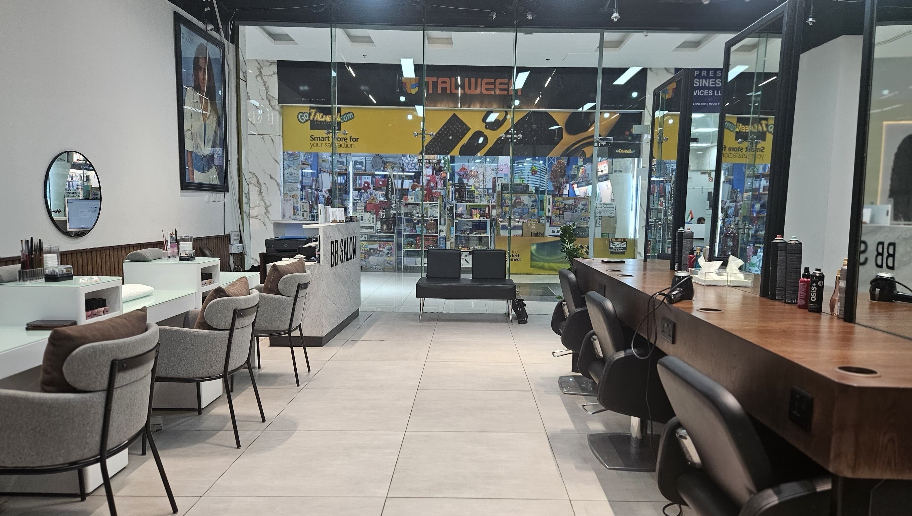 Interior view of BB Salon Hair & Beauty, Dubai, Dubai, AE, with modern styling stations and comfortable seating.