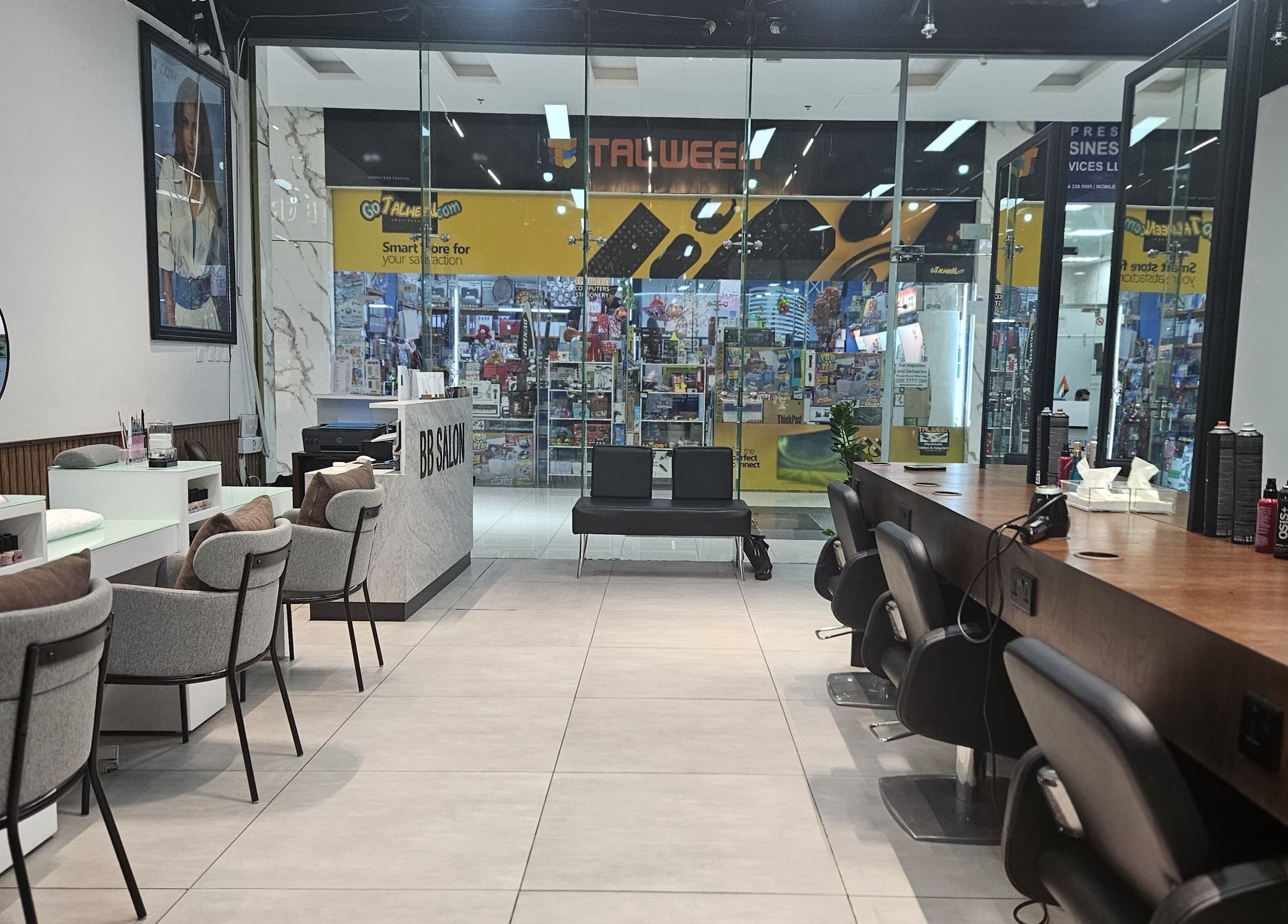 Interior view of BB Salon Hair & Beauty, Dubai, Dubai, AE, with modern styling stations and comfortable seating.