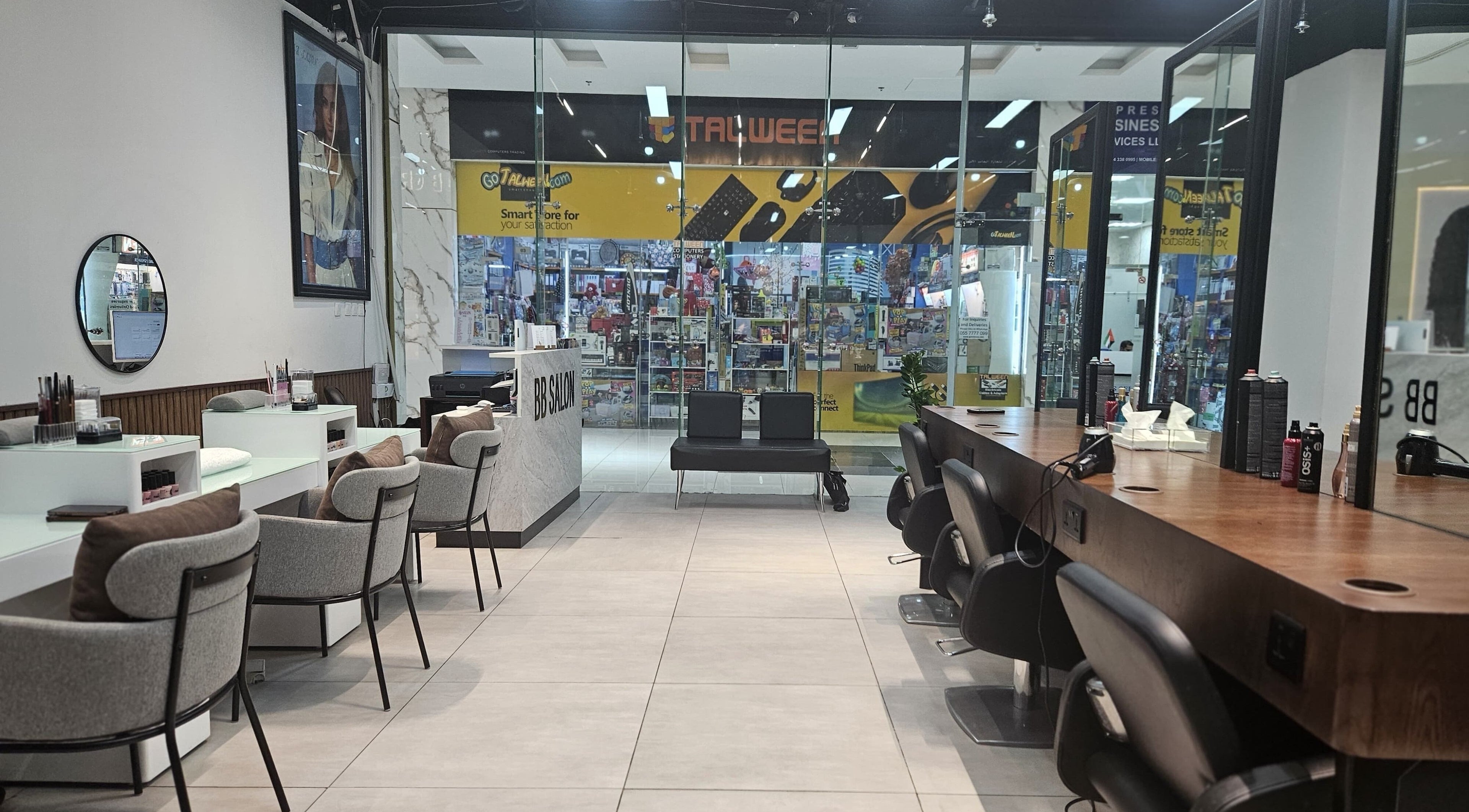 Interior view of BB Salon Hair & Beauty, Dubai, Dubai, AE, with modern styling stations and comfortable seating.