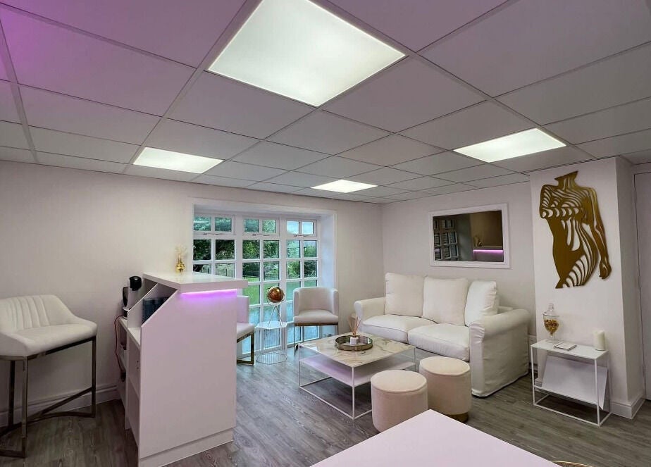 Spacious and elegant interior of Sass Aesthetics Training Academy in Milnrow, England, GB with modern decor.