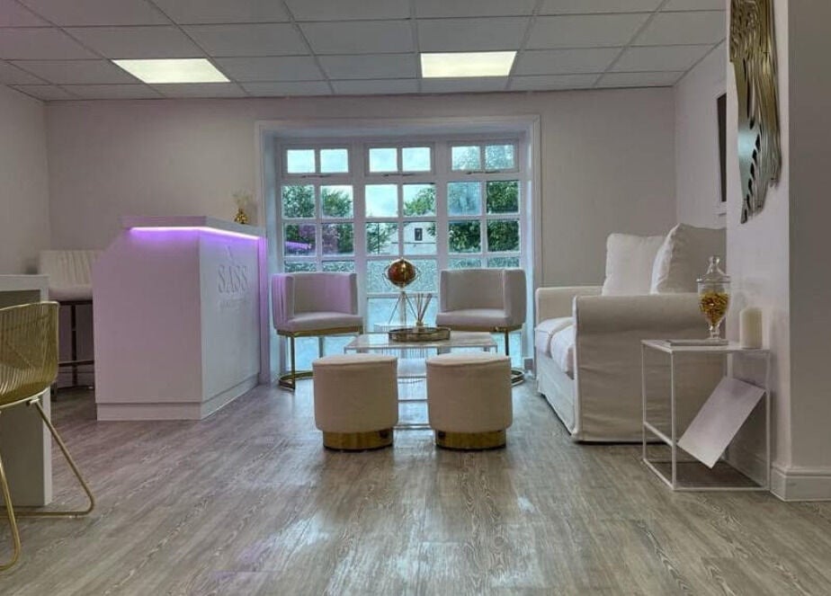 Chic reception area of Sass Aesthetics Training Academy, Milnrow, England, GB with modern decor.