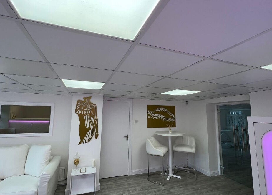 Sass Aesthetics Training Academy lounge in Milnrow, England showcasing sleek modern decor.