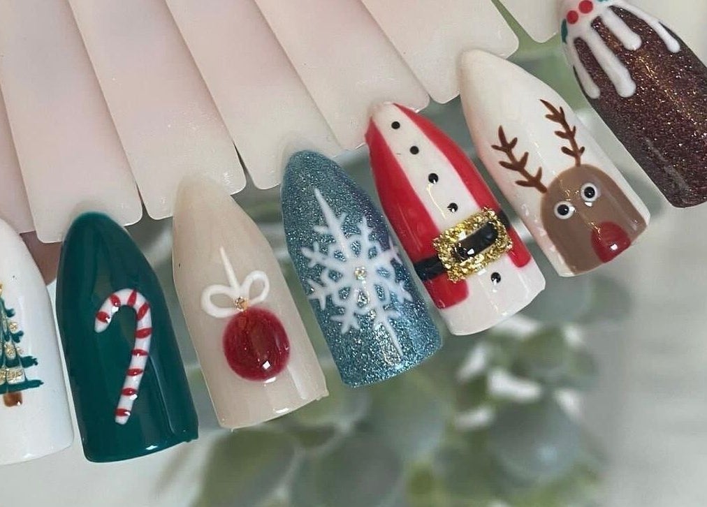 Holiday-themed nail art designs at Libby’s Beauty, Welcombe, England, GB. Perfect for festive celebrations.