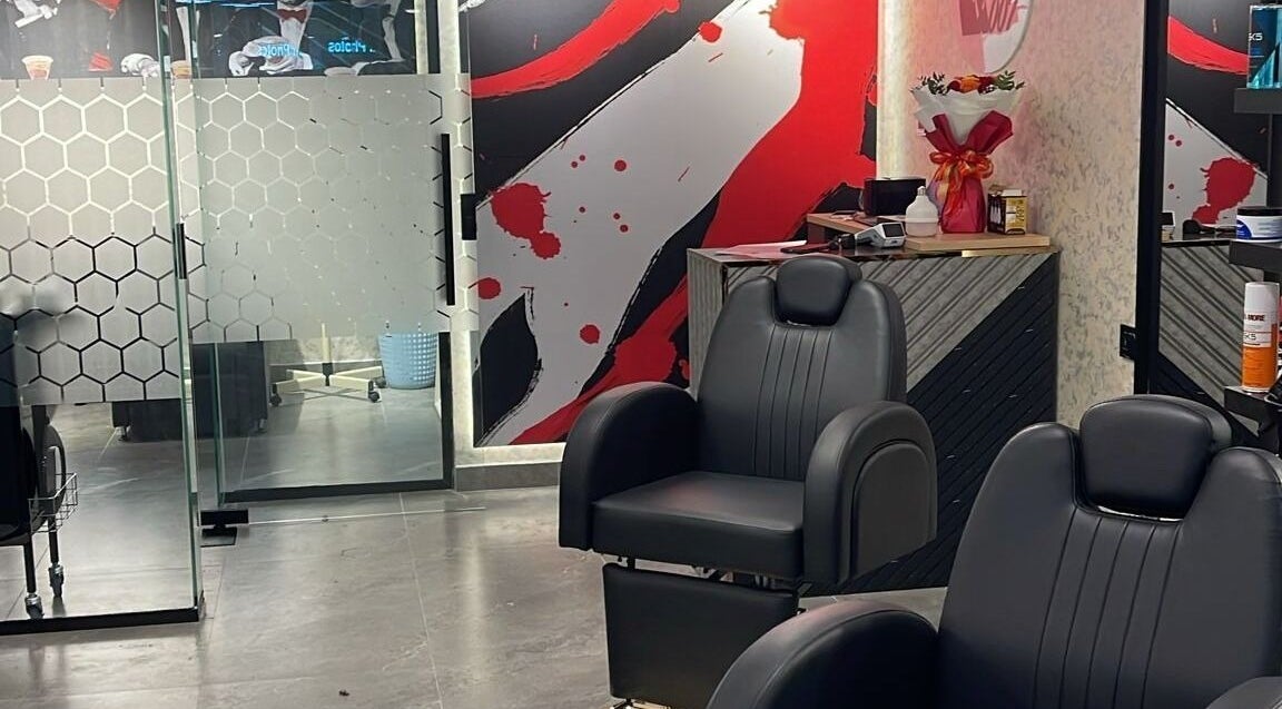 Modern interior of Salon 007 Bahrain Mall in Sanabis, BH with stylish chairs and decor.