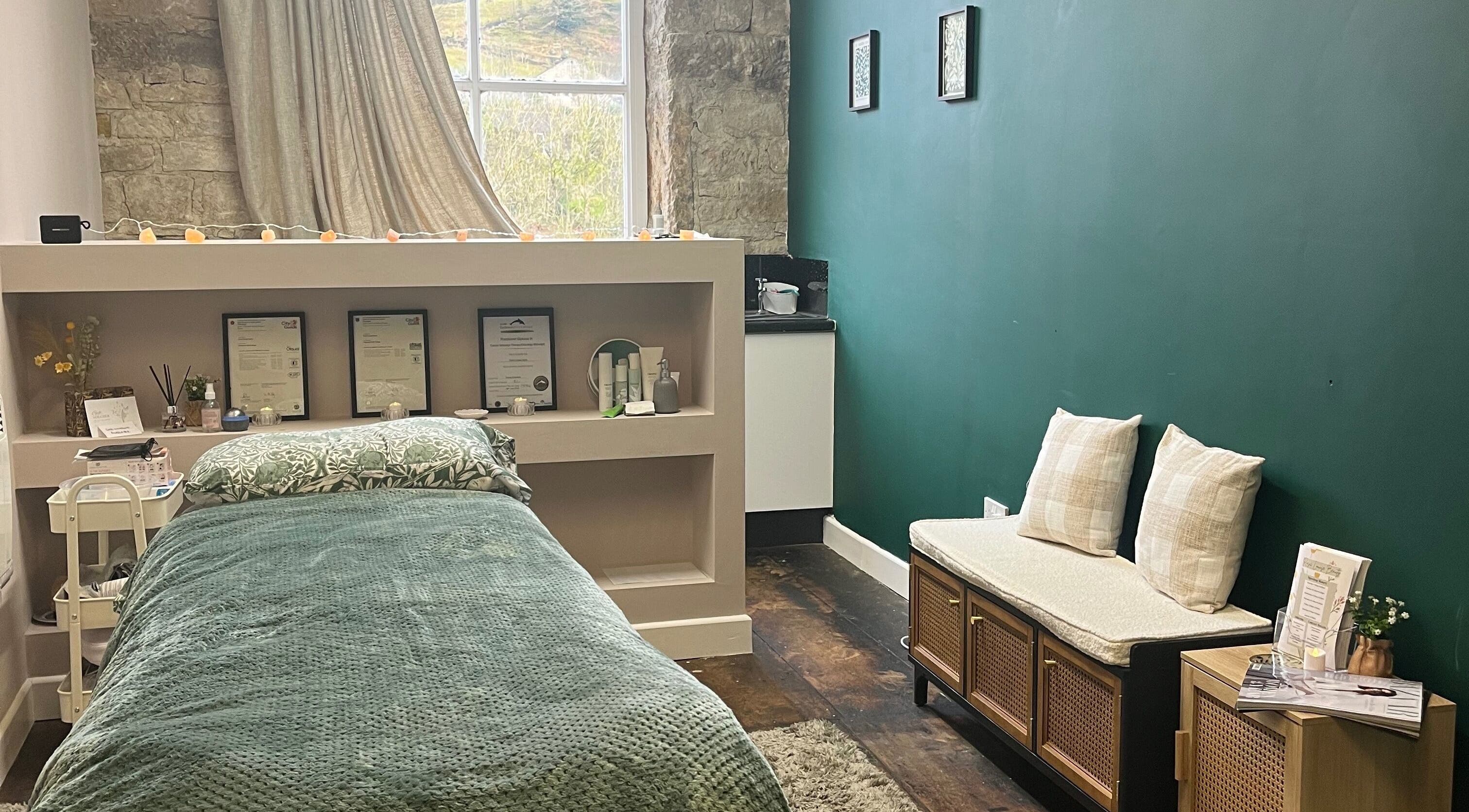 Cozy treatment room at Rosie Louise Beauty, Walsden, England, GB with a relaxing green and natural décor.