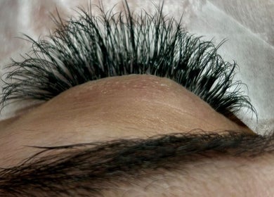 Close-up of eyelash extensions at Rebel Lashes Perth, Western Australia, enhancing eye beauty.