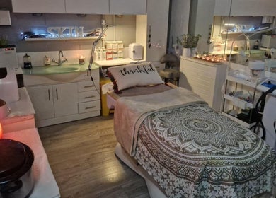 Cozy treatment room at Soozen Sunderland, decorated with candles, in Sunderland, England, GB.