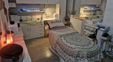 Cozy treatment room at Soozen Sunderland, decorated with candles, in Sunderland, England, GB.