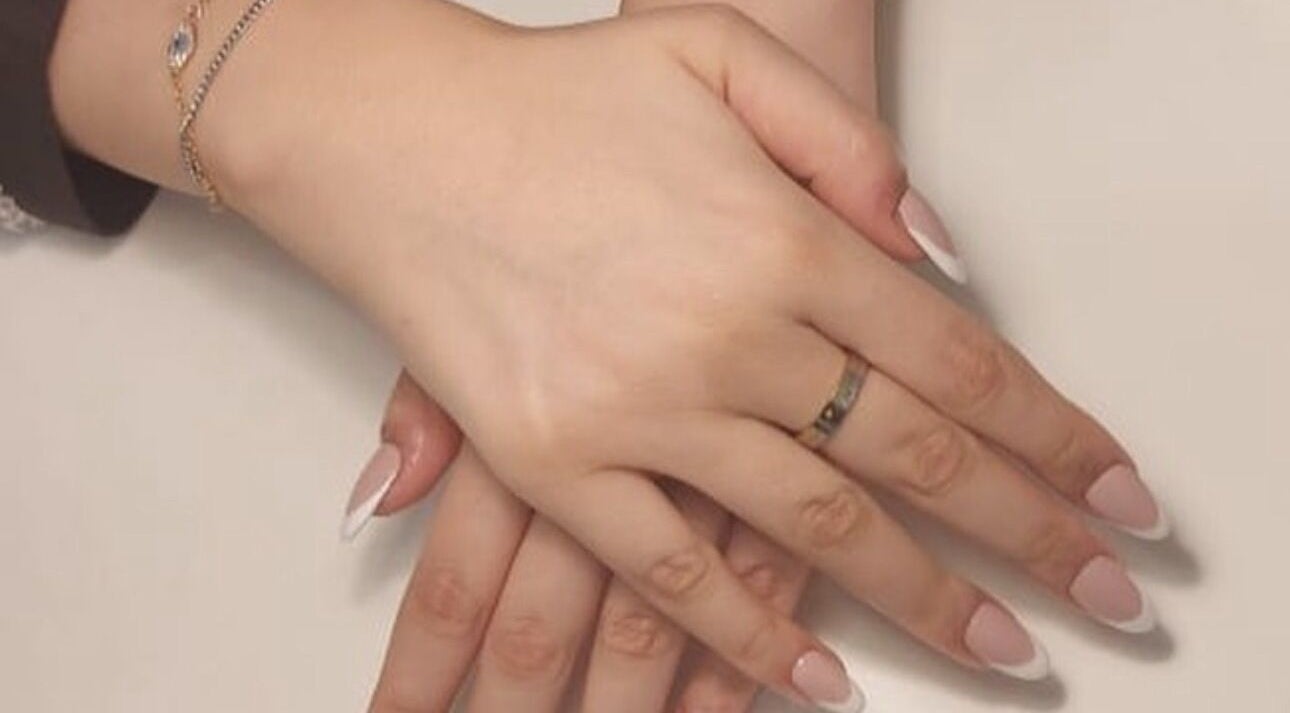 sleek nails with french tips at Baklah Salon in Al Khobar, Eastern Province, SA.