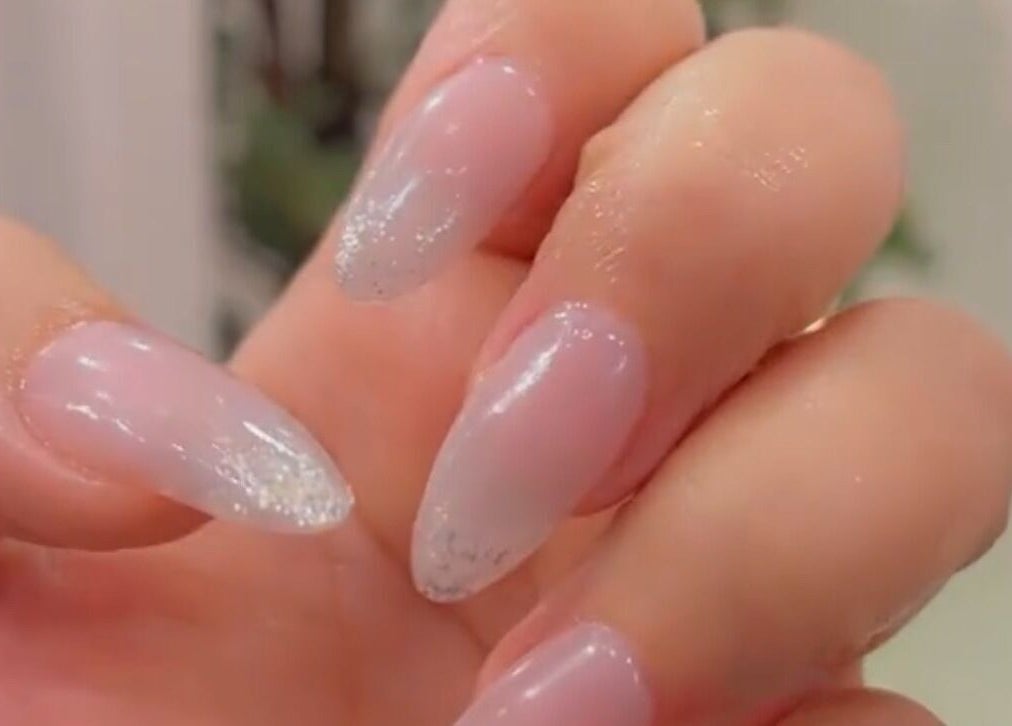 Stylish glitter-coated nails at Baklah Salon, Al Khobar, Eastern Province, SA.