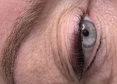 Close-up of expertly shaped eyebrow at MG Institute of Beauty & Training Academy, Cheltenham, England, GB.