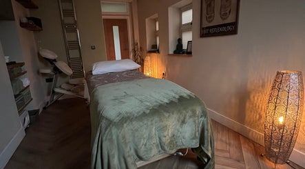 Tranquil massage room at Humblebee Wellness, Saint Leonards, England, GB, offering relaxation and comfort.