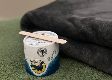 Massage balm and towel at Humblebee Wellness, Saint Leonards, England, GB.