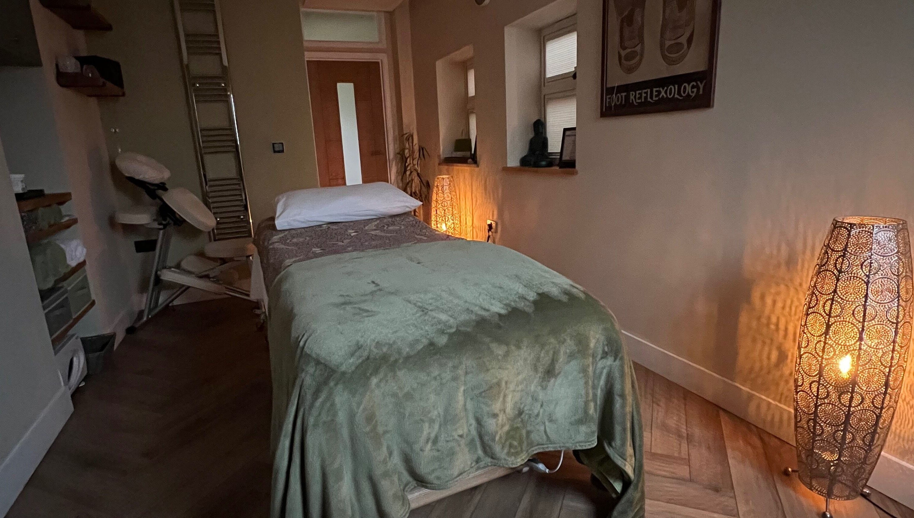 Tranquil treatment room at Humblebee Wellness, Saint Leonards, England, GB, featuring a massage table and soft lighting.