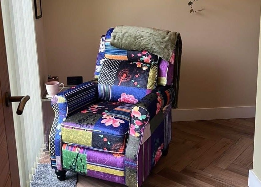 Cozy patchwork chair at Humblebee Wellness, Saint Leonards, England, GB. Perfect for relaxation.