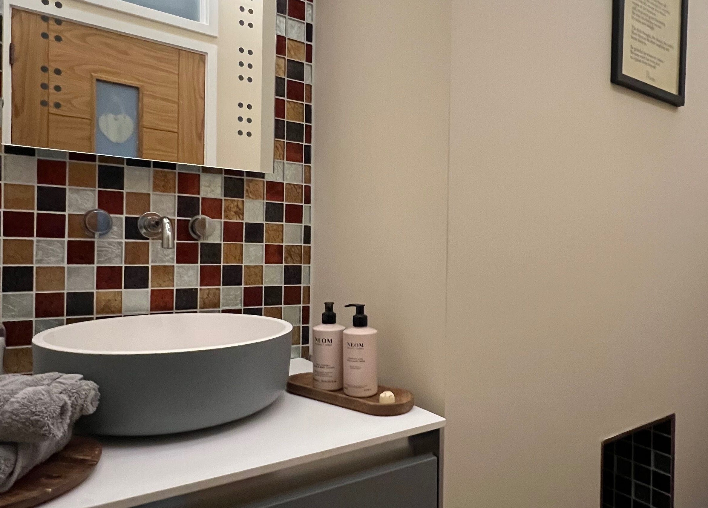 Serene bathroom at Humblebee Wellness, Saint Leonards, England, GB with stylish sink and decor.