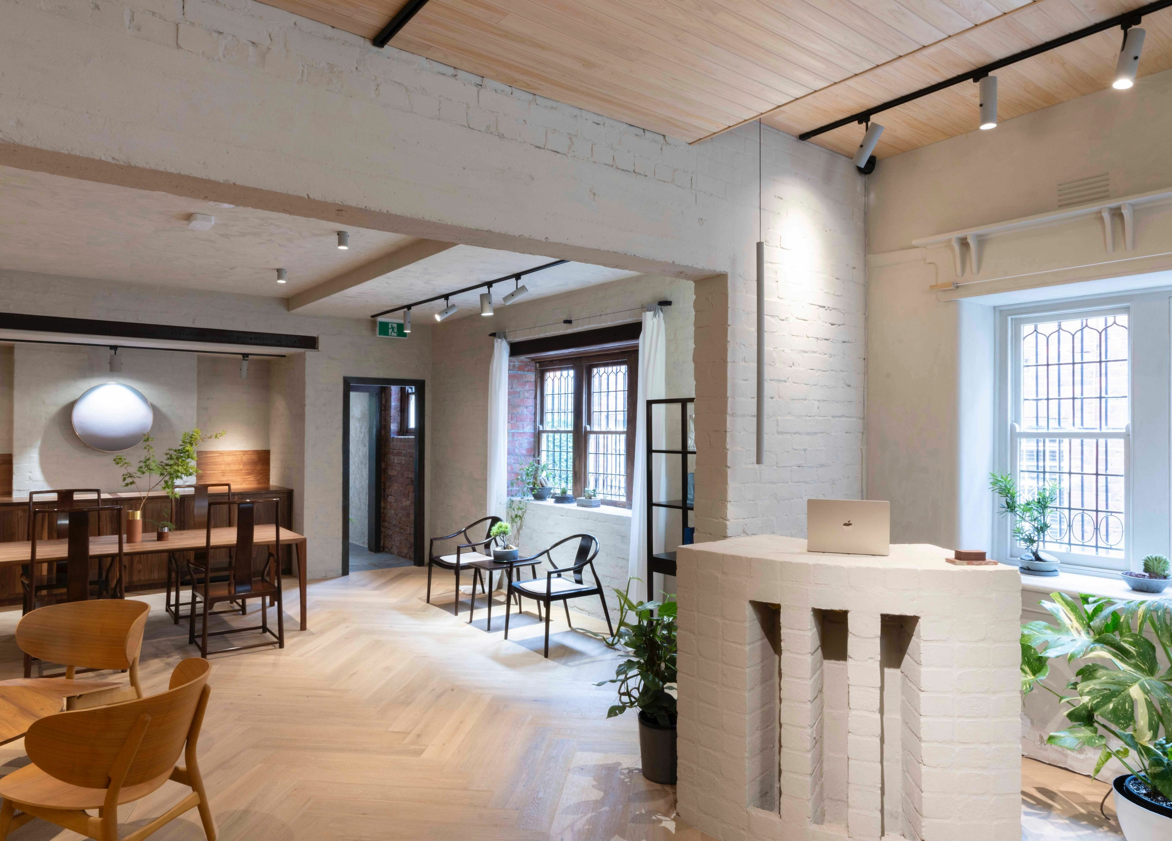 Elegant lounge area in In the Brick Spa, Melbourne, Victoria, AU, featuring modern decor and natural light.