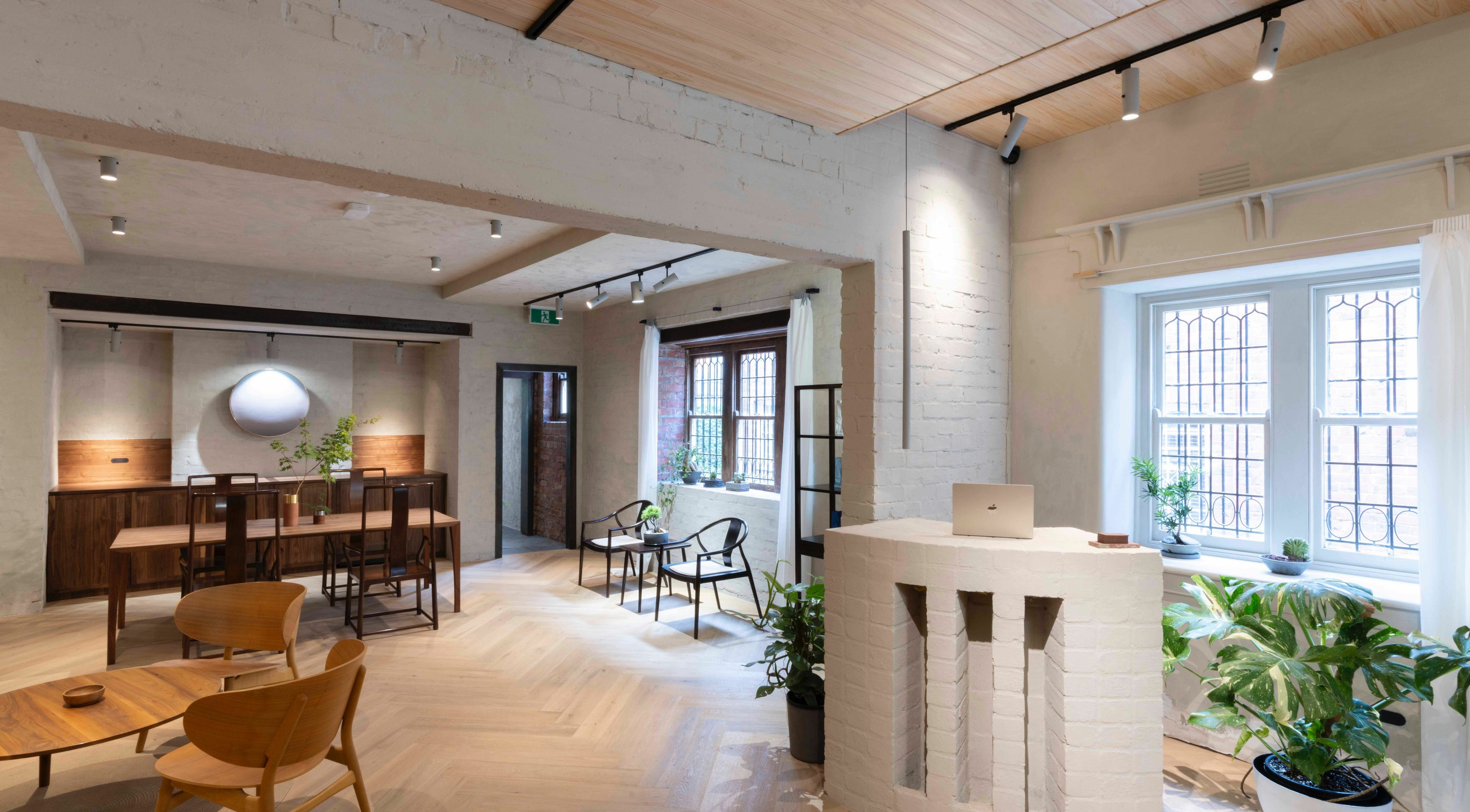 Elegant lounge area in In the Brick Spa, Melbourne, Victoria, AU, featuring modern decor and natural light.