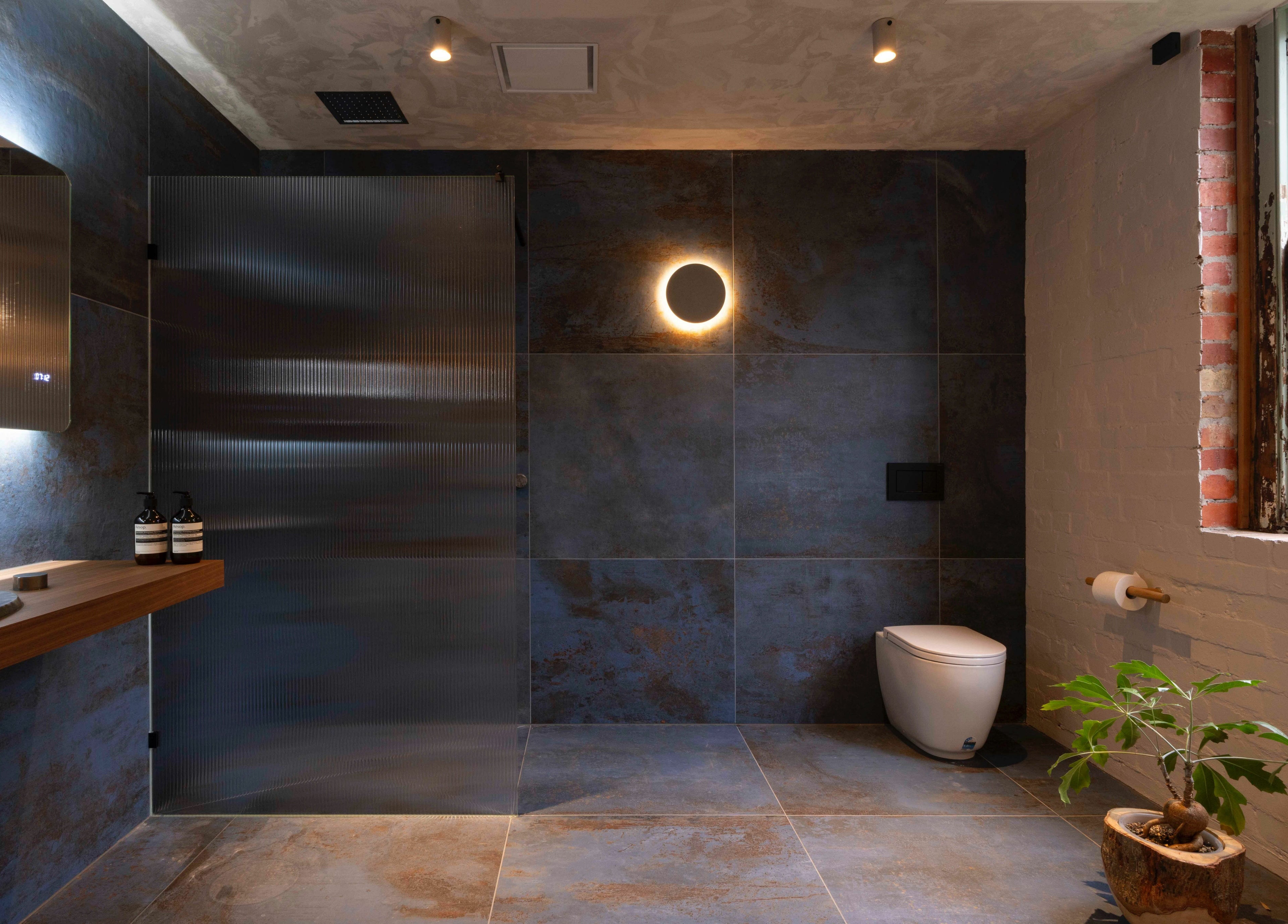 Elegant spa bathroom at In the Brick Spa, Melbourne, Victoria, AU, featuring a sleek design and natural elements.