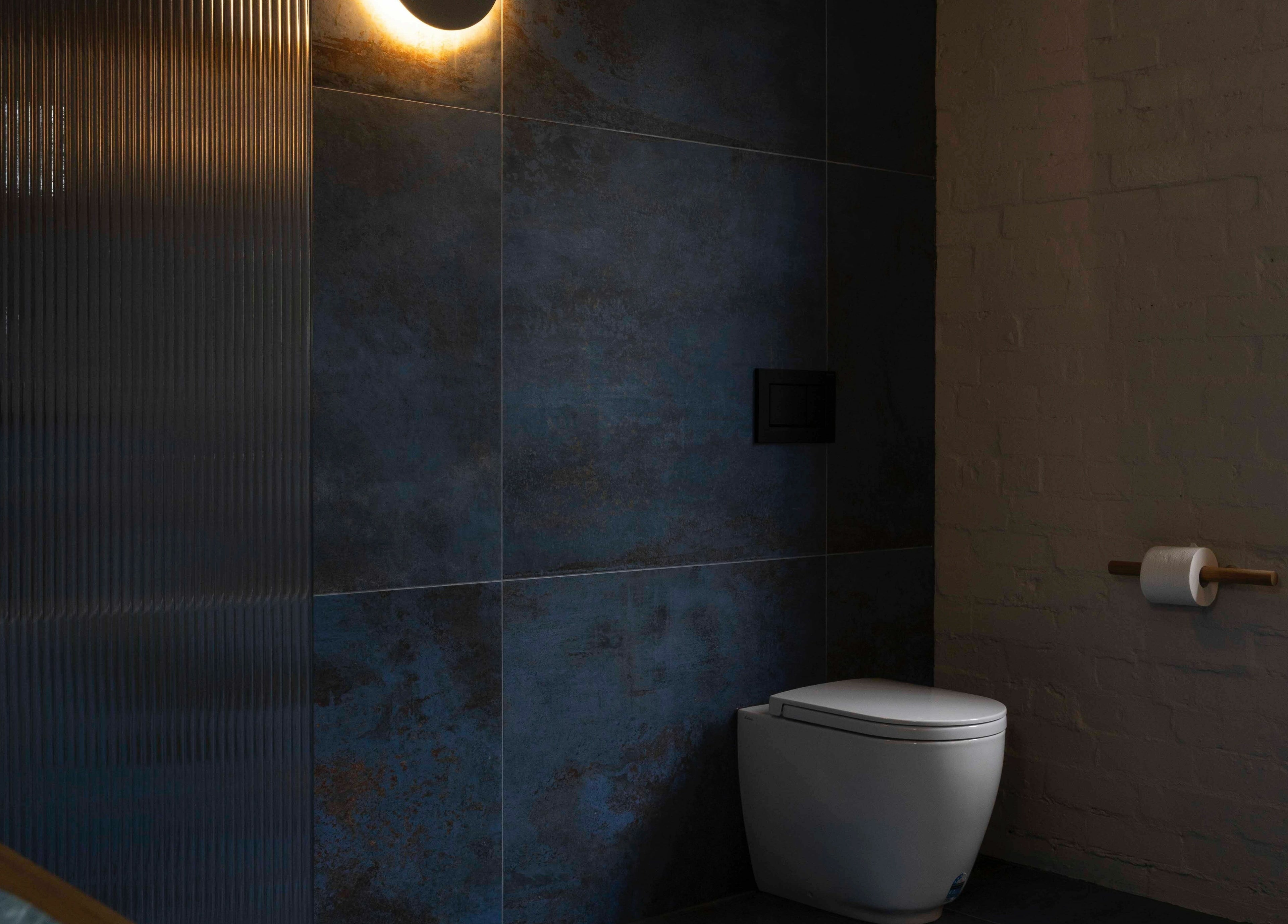 Sleek restroom design at In the Brick Spa, Melbourne, Victoria, AU showcasing modern elegance and comfort.