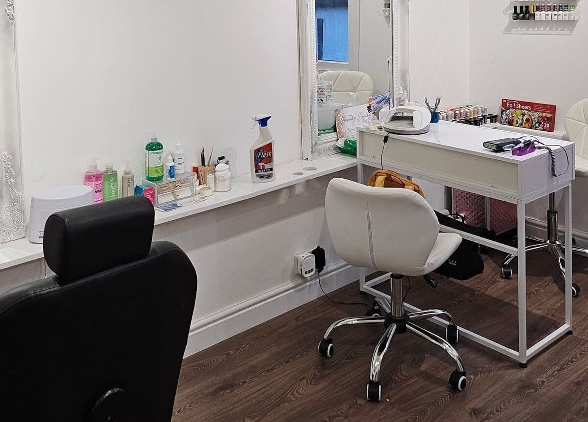 Elegant salon setup at Hannah's Be You Beauty in Norwich, England, GB, featuring modern chairs and beauty tools.