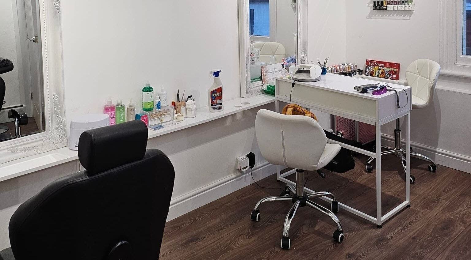Elegant salon setup at Hannah's Be You Beauty in Norwich, England, GB, featuring modern chairs and beauty tools.