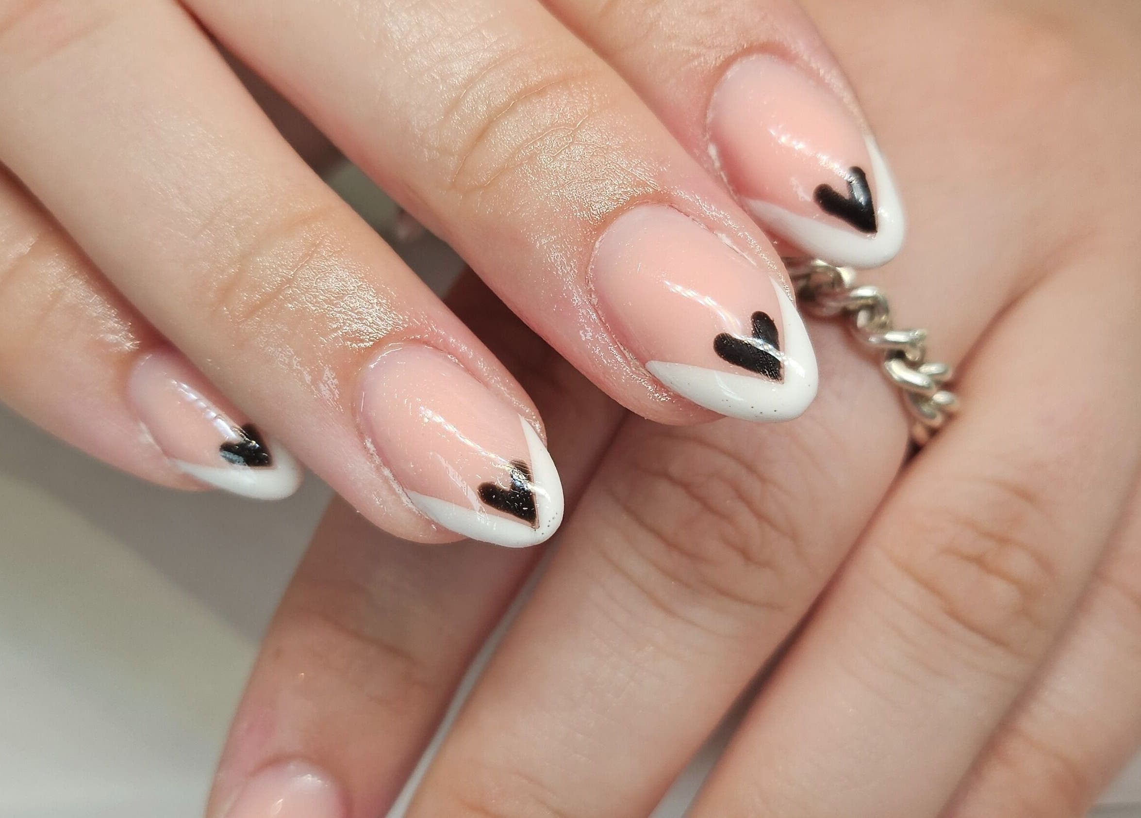 Elegant heart nail art at Hannah's Be You Beauty, Norwich, England, GB.
