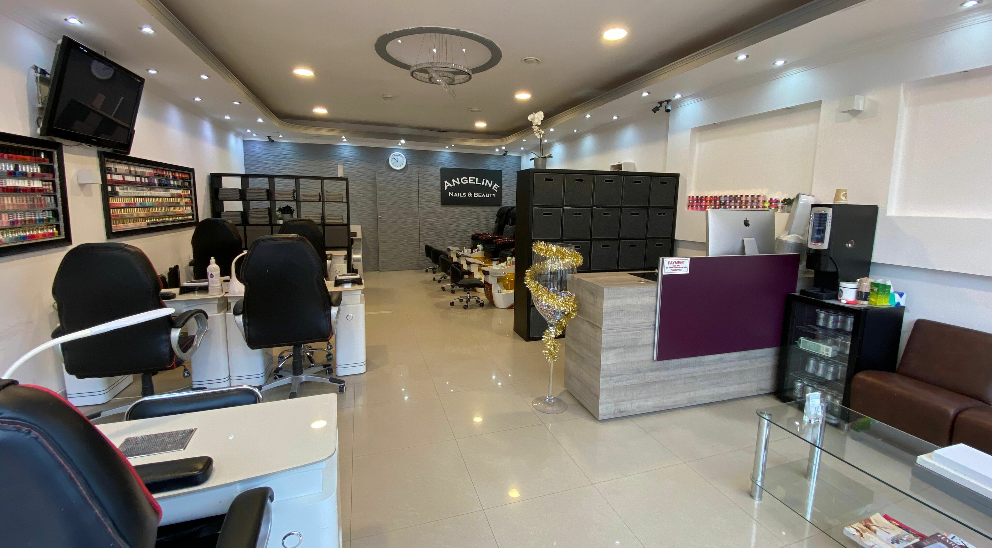 Interior of Angeline Nails Morden showcasing modern nail stations in Morden, England, GB.